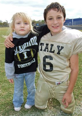 Image: Proud pair — IYAAs Co-MVP of the 2010 NESA B-Division Superbowl, Ryder Itson, shares the joy of his team’s win with his kid sister, Azlin.