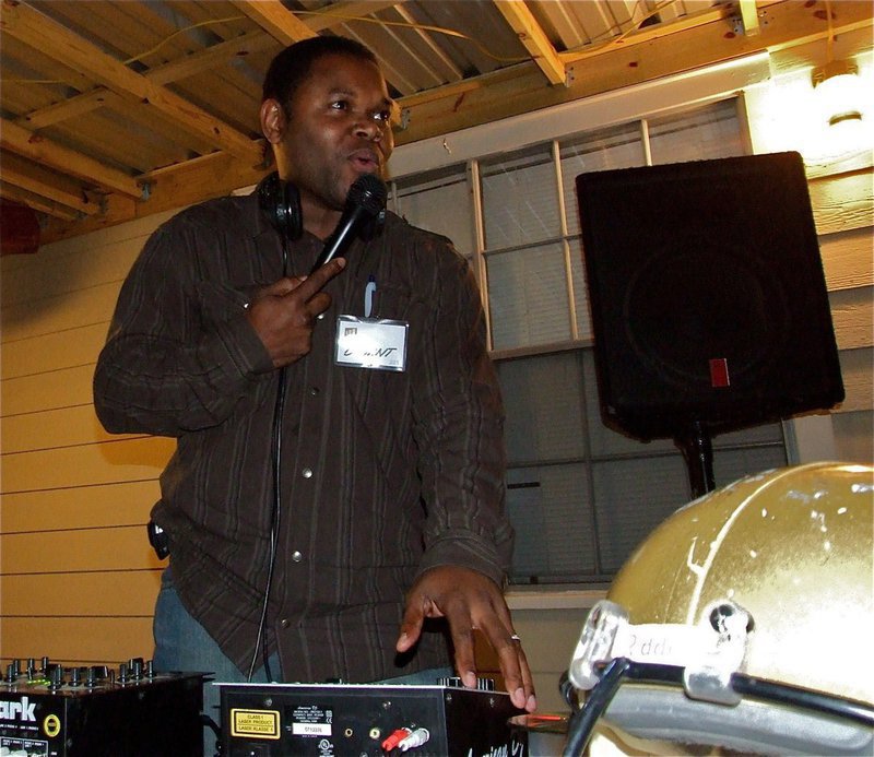 Image: We’re ready! — The original Mr. Microphone and former IYAA coach Bryant Cockran volunteers his time as DJ during the IYAA Bonfire Party.
