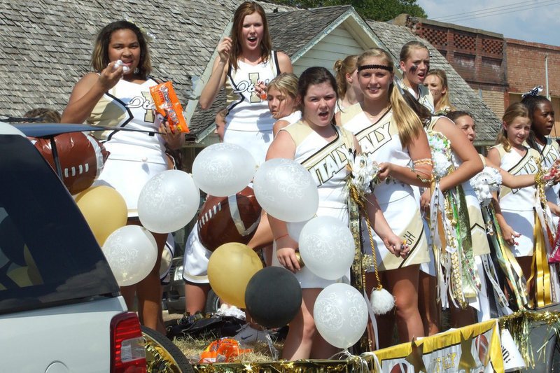 Image: Go Italy, Go! — Italy’s Varsity &amp; Junior High Cheerleaders throw candy down on Main Street and raise spirits up during the Homecoming parade.