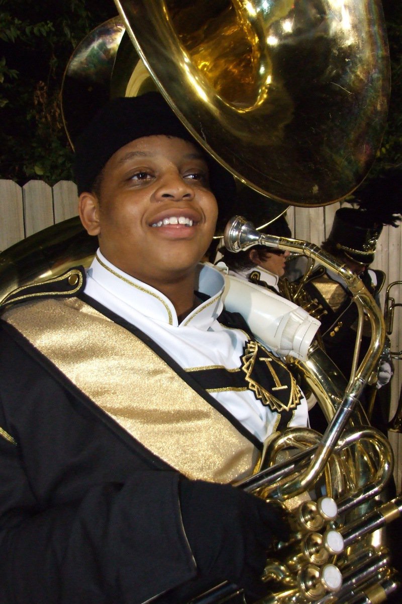 Image: Timothy Fleming — Gladiator Regiment Band member Timothy Fleming gets set to play the tuba during halftime of the Homecoming game.