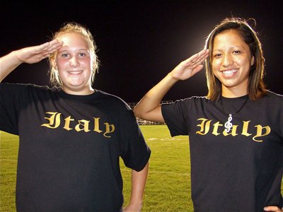 Image: We salute you! — Assistant drum major Drenda Burke and drum major Jessica Hernandez salute during halftime of the rivalry battle between Italy and Palmer.