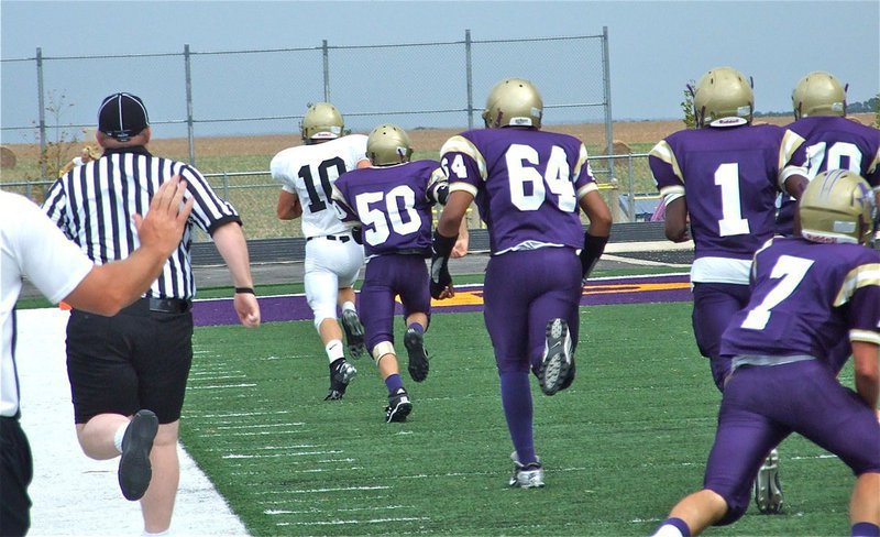 Image: And he does — Chase Hamilton(10) leaves a wake of Panthers behind as he dashes 66-yards for a touchdown to make the game 8-6.