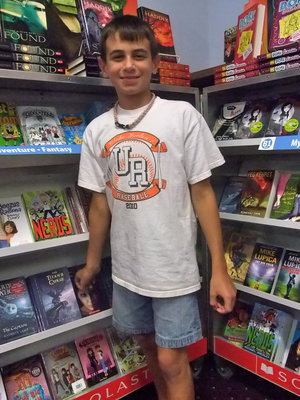 Image: Trevor Mott — Trevor said, " I am here tonight buying books and trying to win a book in the book walk."