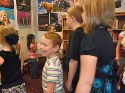 Image: Book Walk- Lots of Fun — Lots of smiles going around in circles during the book walk.