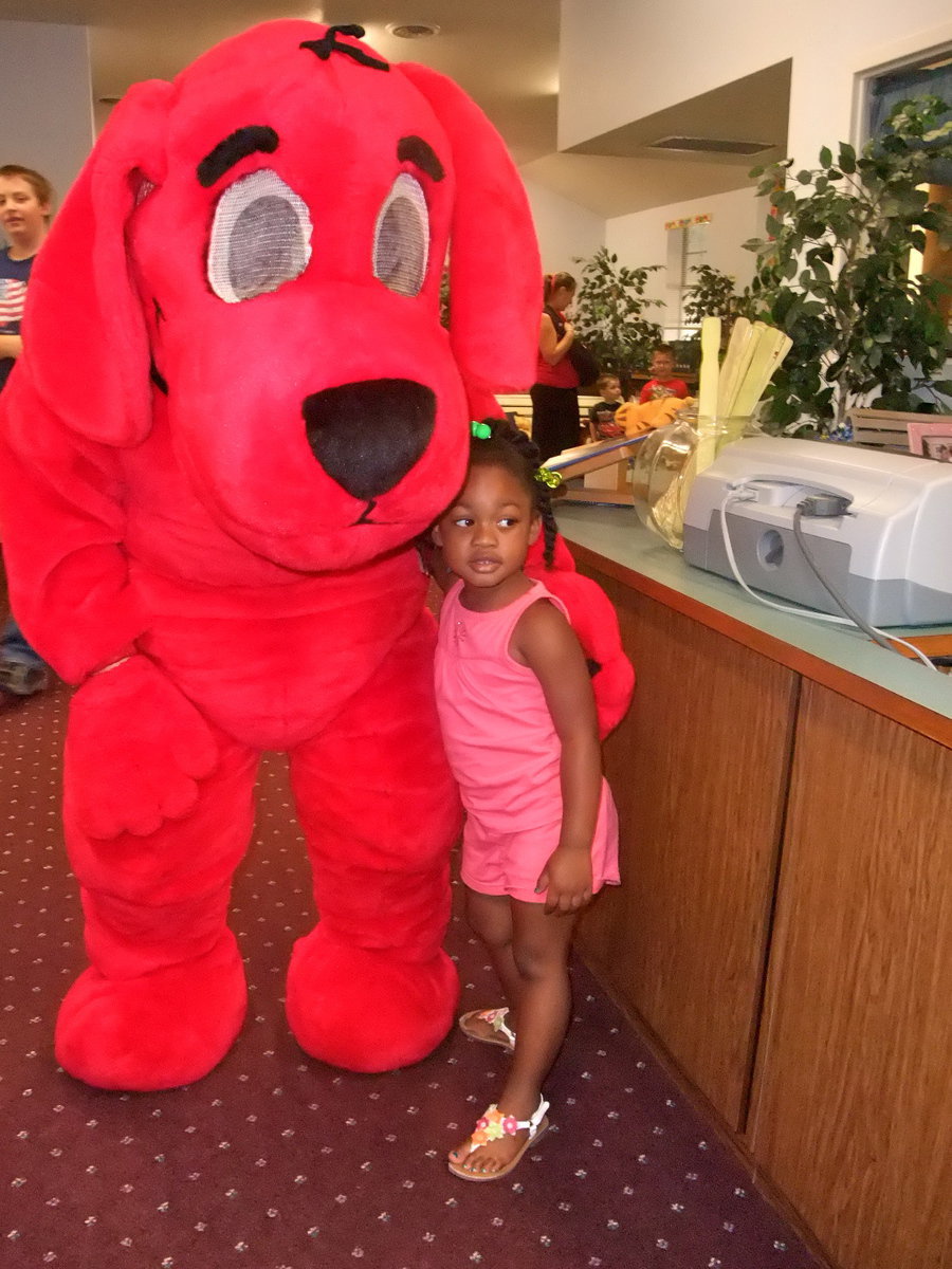 Image: Clifford and McKinzie — McKinzie just loves Clifford.