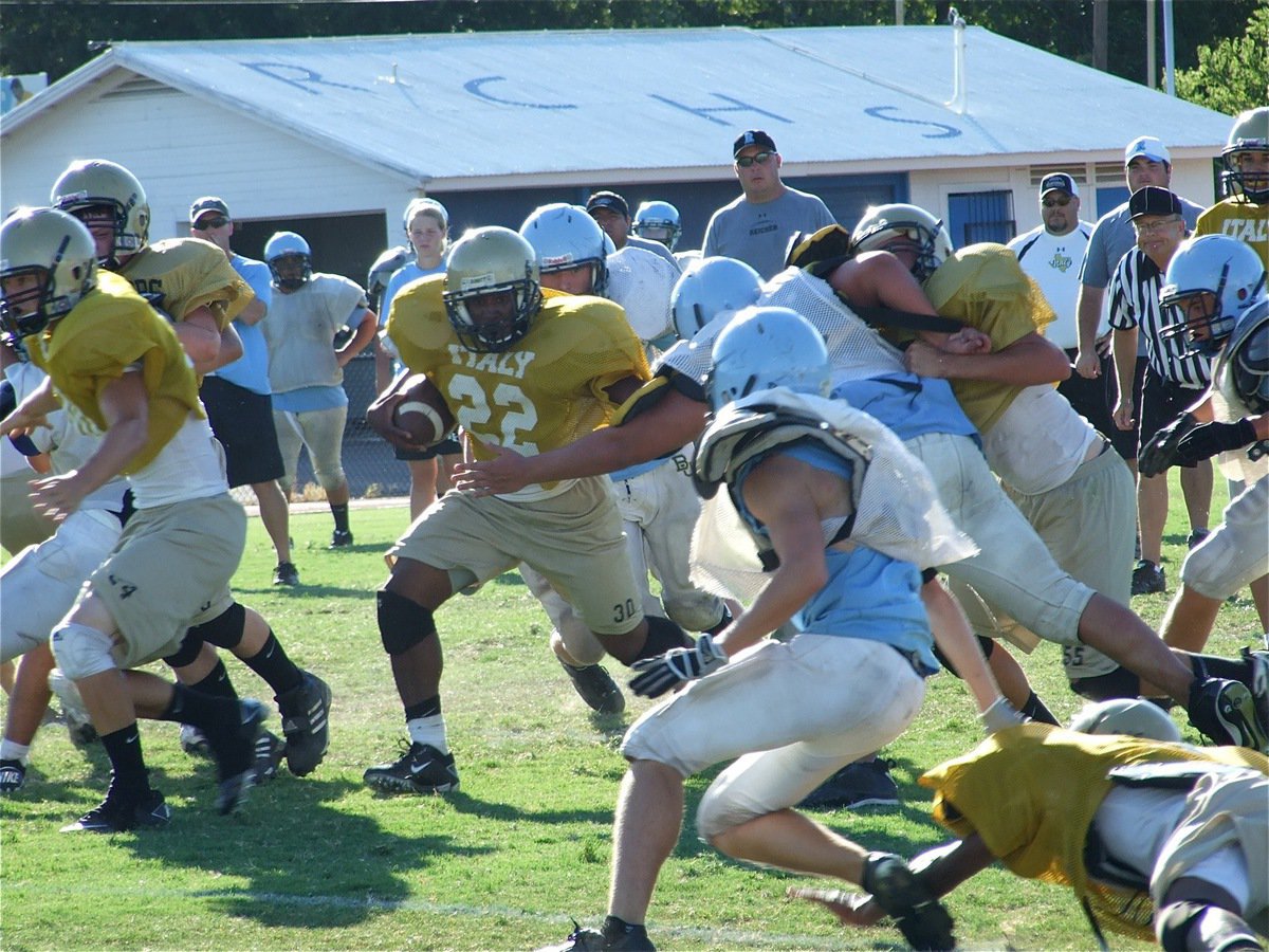 Image: Lewis gets a crease — Jalarnce Jamal Lewis follows his blockers thru the hole and down the field for a 70-yard touchdown run.