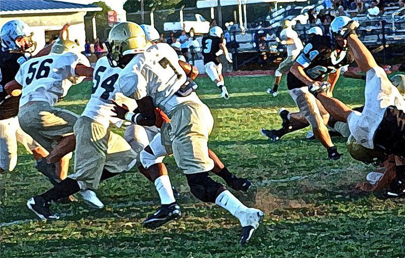 Image: Scenic Senio — Italy’s Jasenio Anderson creates a scenic landscape when he carries the ball behind his offensive line.