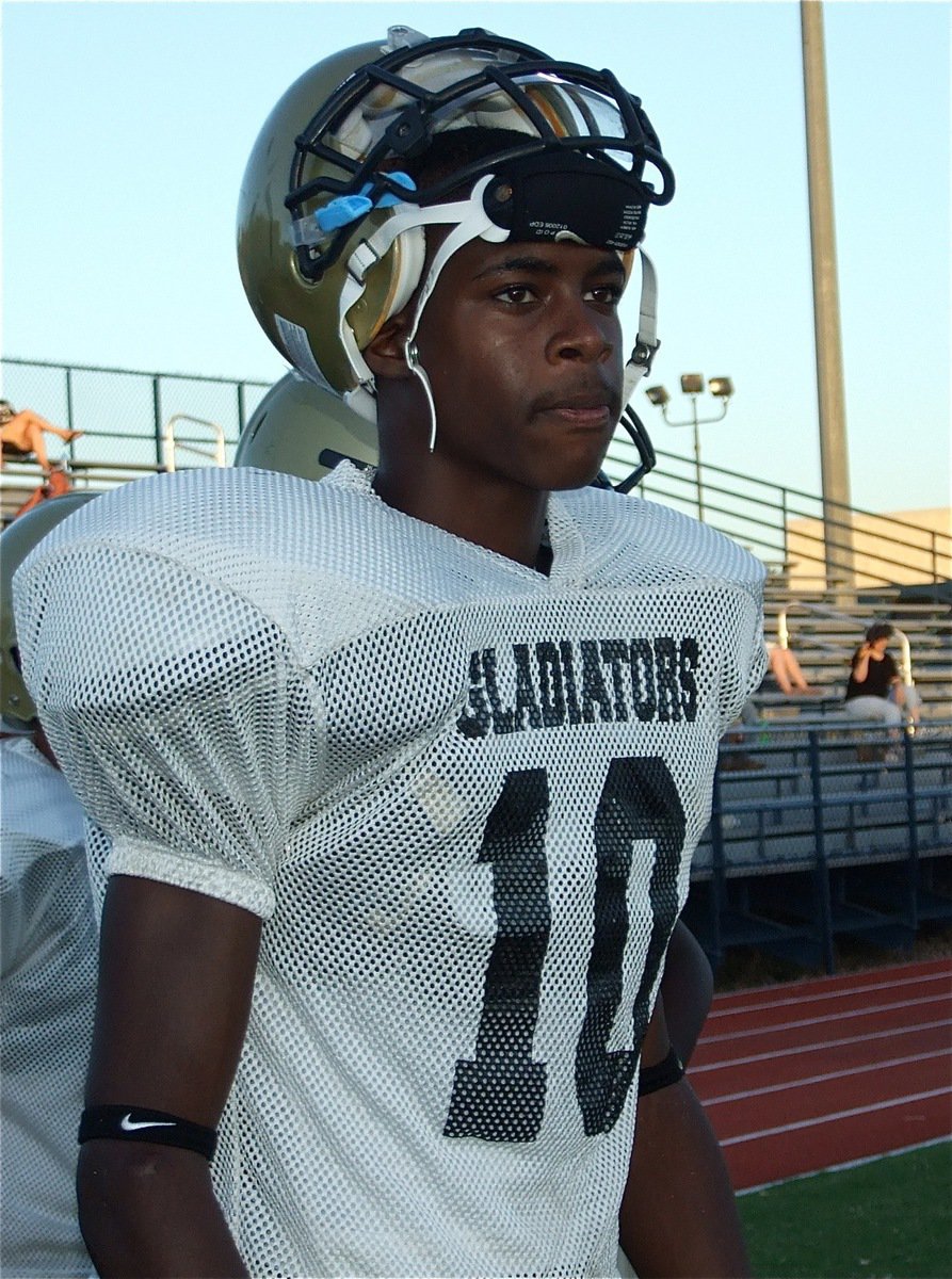 Image: Into the game — Devonta Simmons takes a break from the scrimmage.