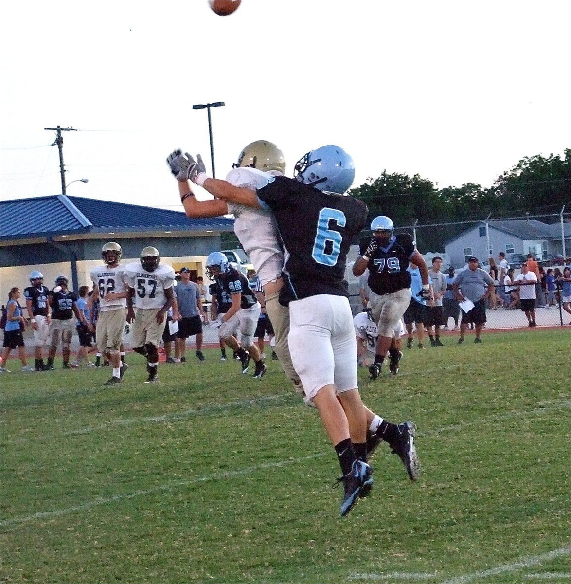 Image: Pass interference — Italy’s Colton Campbell gets hit before the ball arrives and the Gladiators get the call.