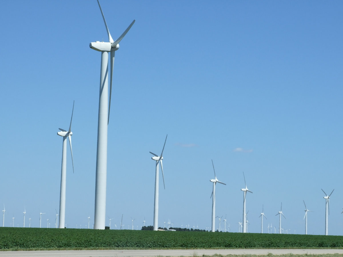 Image: Renewable energy and cotton — Wind farms are abundant in the western corridor of Texas.  One of the largest farms in the nation is located in Roscoe County and cotton is still the king.