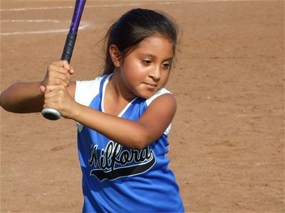 Image: Gabby Castilleja — Gabby doesn’t say much while practicing her swing.