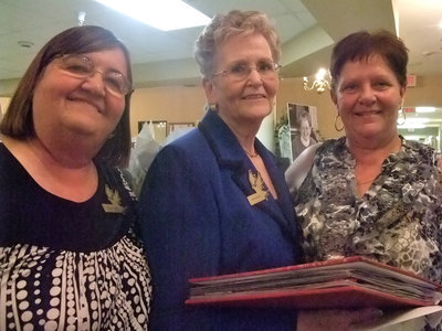 Image: Carolyn, Marie and Debbie — Carolyn Powell, Marie Wood and Debbie Knot, (all employees of Trinity Mission). Carolyn said, “We hate to say good bye to our dearest friend Marie, she is off on new adventures with her family and we wish her very happy trails till we meet again, we love you Marie.”
