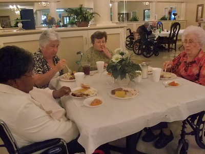 Image: Residents Having Fun — Everyone is ready to eat.
