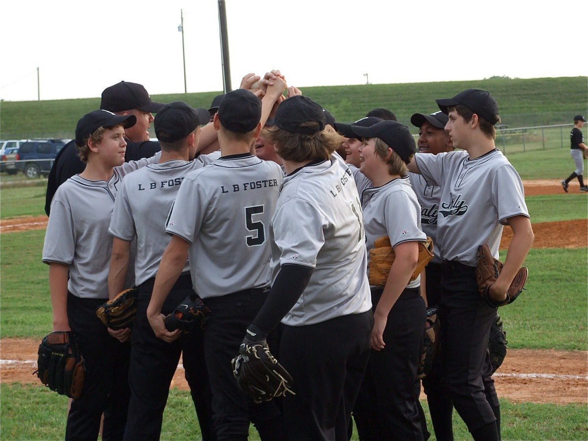 Image: Having fun — Gladdog coach Lewis Essary keeps the team loose during a game against Whitney.