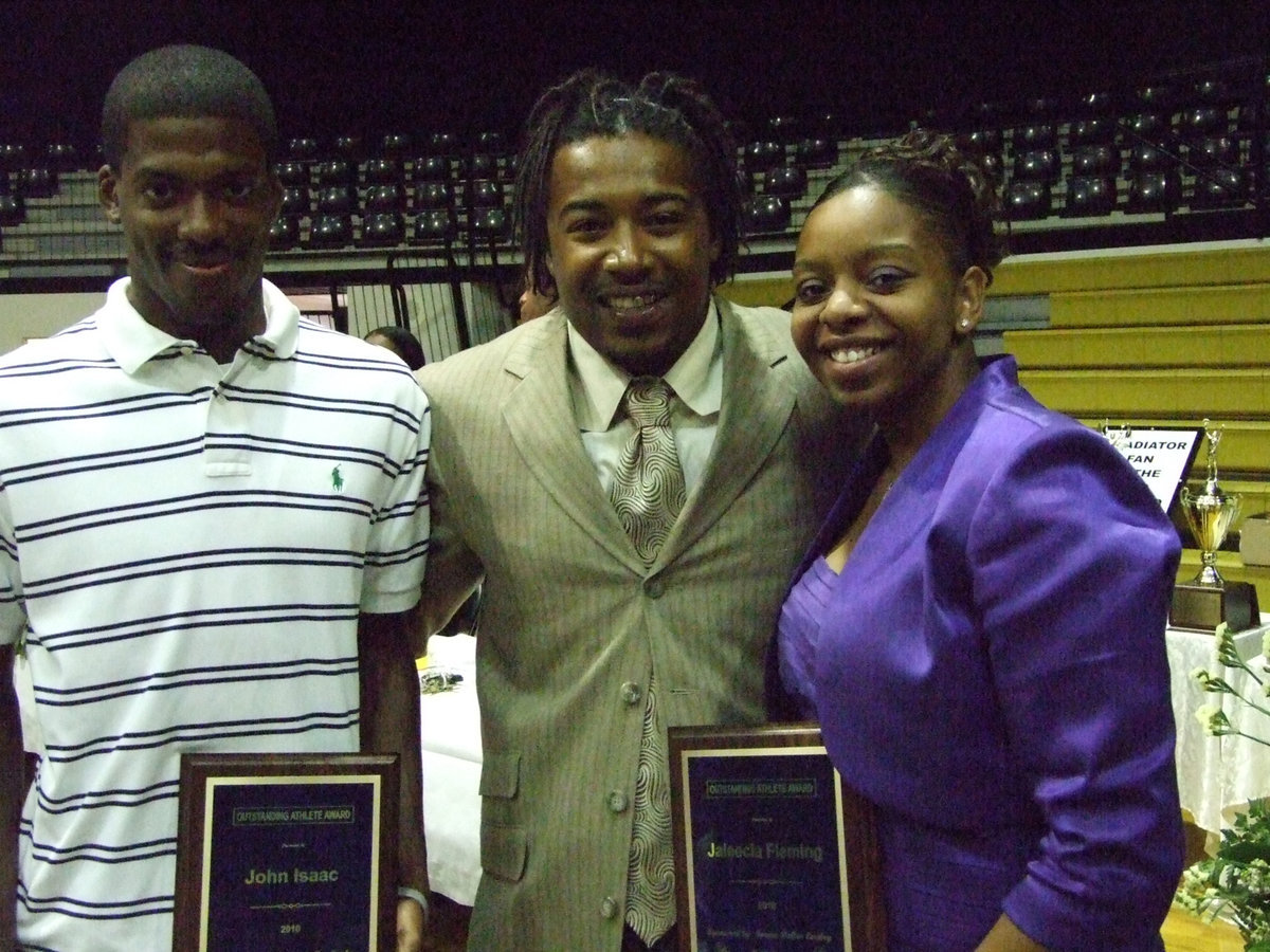 Image: Keith Davis award recipients — IHS Alumni Keith Davis presented John Isaac and Jaleecia Fleming a special award.