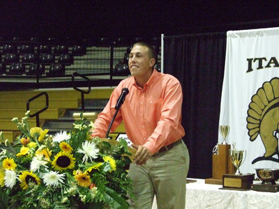 Image: Old Gold — IHS Alumni Josh Howard speaks to the crowd about supporting the Booster Club.
