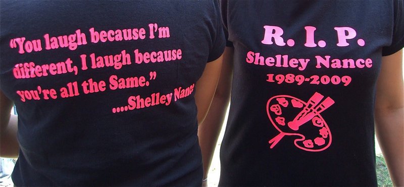 Image: R.I.P. Shelley — Shirts worn by former classmates, Diana Cortez and Krystyna Cambell honor Shelley’s unique personality and artistic talent.