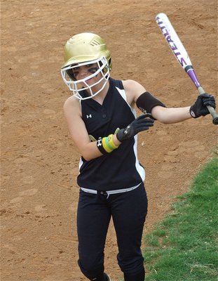 Image: Drew to the plate — What every pitcher fears, senior Drew Windham striding to the plate with that look in her eye…