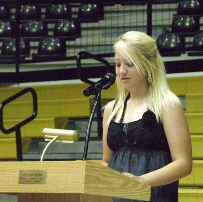 Image: Megan gives award — Megan Richards gives Megan Hopkins the President’s Award.