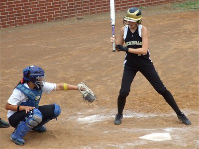 Image: Strike! — Alyssa Richards catches a strike thrown right down the middle by Courtney Westbrook.
