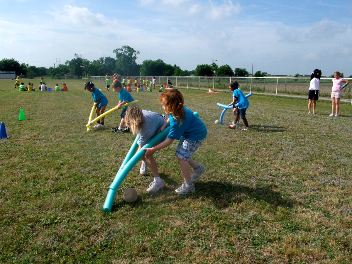 Image: Whoops! Missed the Ball — These students are trying hard.