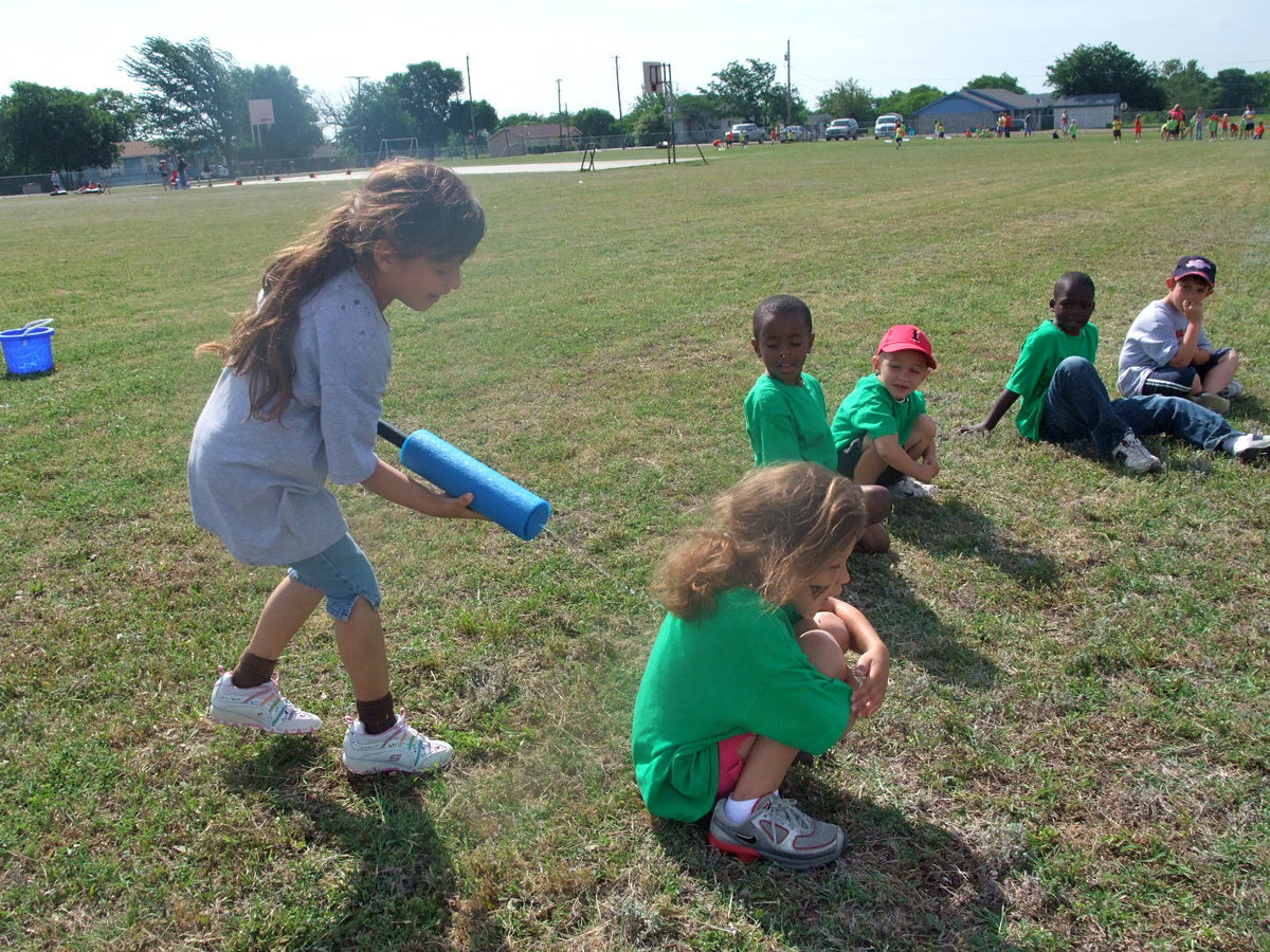 Image: Got You! — She was happy to tag her opponent with her squirt gun.