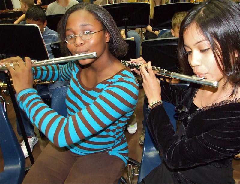 Image: More flutes — 7th graders Kierra Wilson and Lupita Rincon play their flutes during the Spring Concert.