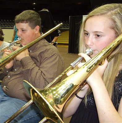 Image: Mercer &amp; Nelson — 7th grade trombonists’ Zach Mercer and 1st chair Kelsey Nelson slide to the music.