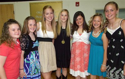 Image: 7th graders rock — A few members of the 7th grade Band pose after performing in the Spring Concert: Tara Wallis, Reagan Cockerham, Jaclynn Lewis, Kelsey Nelson, Bailey DeBorde, Bailey Eubank and Madison Washington.