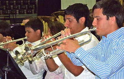 Image: The trumpet section — Trumpeters’ Reid Jacinto, Marisela Perez, 1st chair Taz Martinez and senior Collier Jacinto tear it up. Jacinto was also a Tri-M member and Central Texas Honor Band.