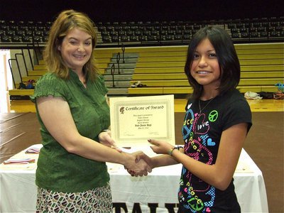 Image: Lupita Rincon — Lupita Rincon is honored with a Certificate of Award from IHS Principal Tanya Parker for Highest Average in Social Studies.