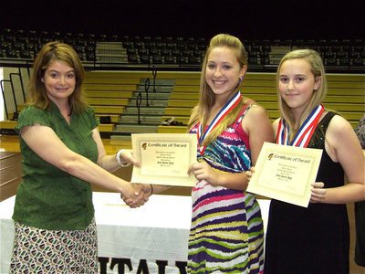 Image: Jaclynn and Kelsey — IHS Principal Tanya Parker presents both Jaclynn Lewis and Kelsey Nelson a Certificate of Award for Highest Average Overall in Mathematics.