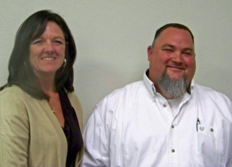 Image: New Public Works director — Italy City Administrator Teri Murdock congratulates Scott Perry, newly hired public works director.