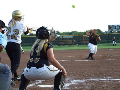 Image: Megan hits — Megan Richards(22) blasts a high pop-up to right field.