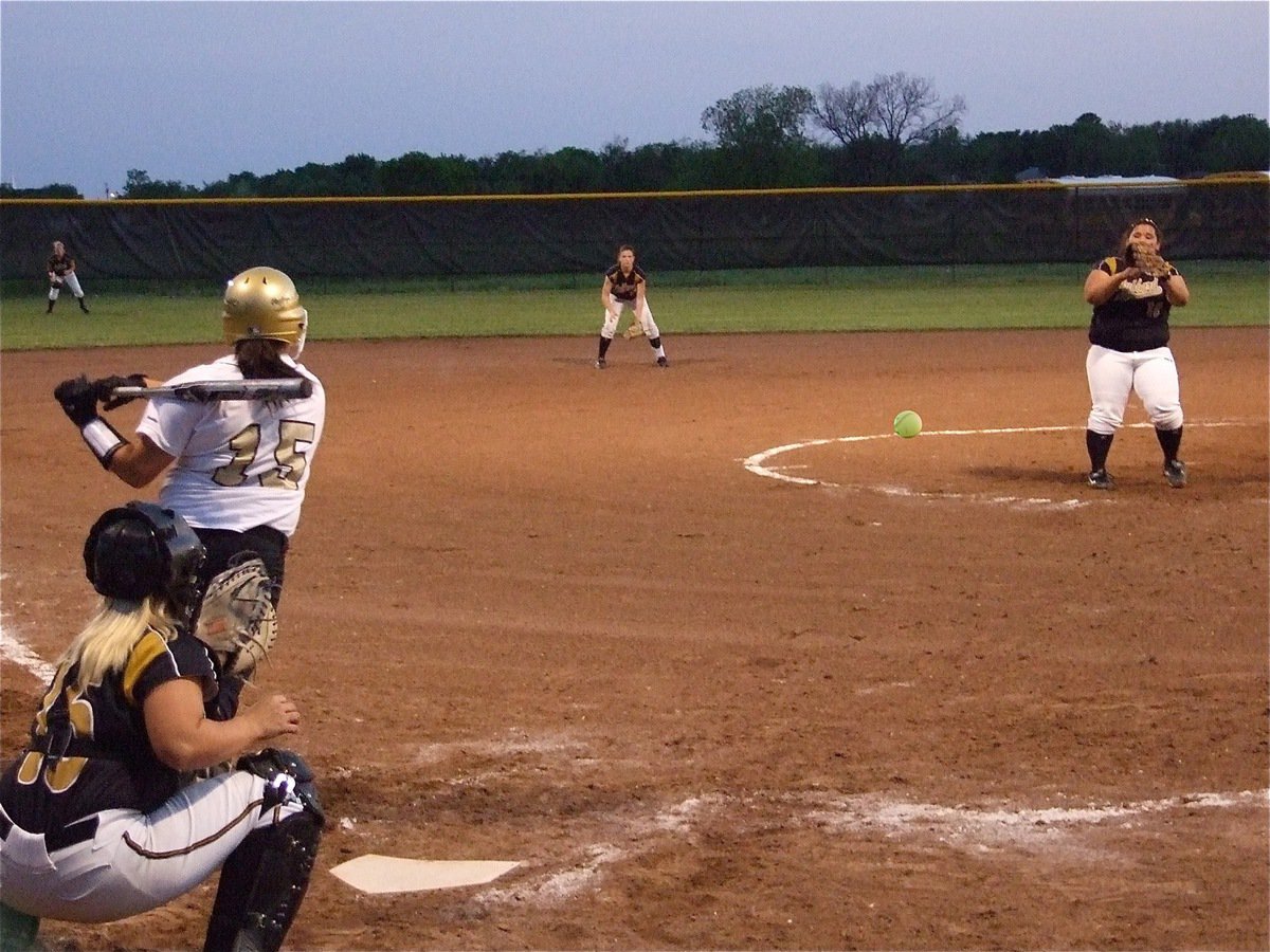 Image: Cori clobbers ball — Cori Jeffords(15) hits to get on base at a crucial time in the rivalry matchup with Hubbard.