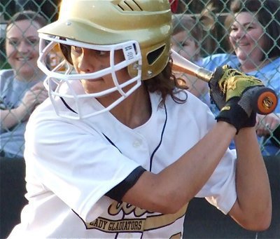 Image: Tight grip — Freshman Anna Viers is aggressive at the plate for Italy.