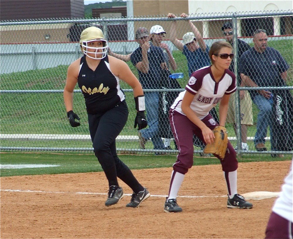 Image: Cori advances — Cori jeffords heads for second base after hitting a single in the top of the 7th inning.