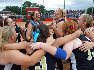 Image: Thrill of victory! — The Lady Gladiators let their fans back in Italy know they just won the bi-district championship! A cell phone would work but this was much more fun.