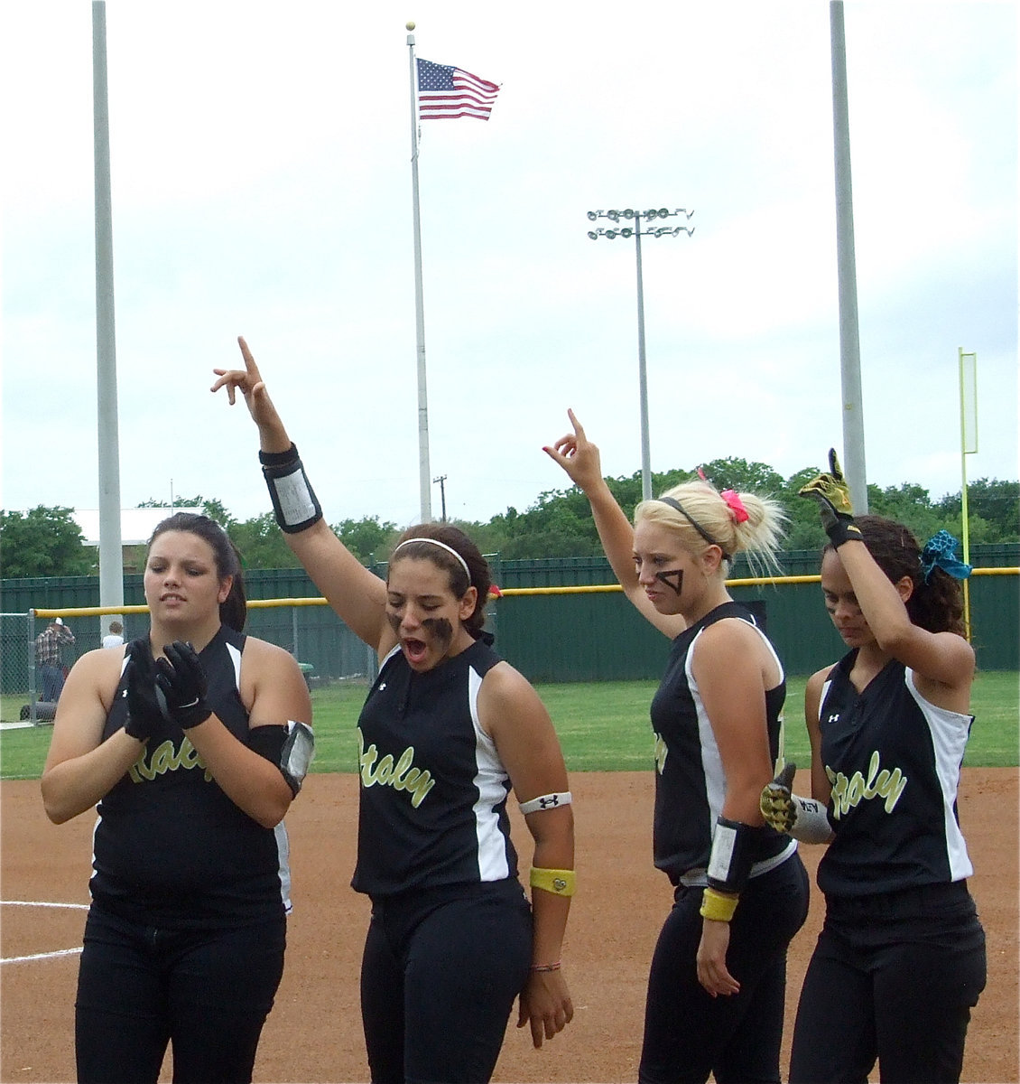 Image: Lady Gladiators get ready to take on Blue Ridge in game 3 — Cori Jeffords, Alyssa Richards, Megan Richards and Anna Viers are ready to play game three against Blue Ridge after the playing of the national anthem.