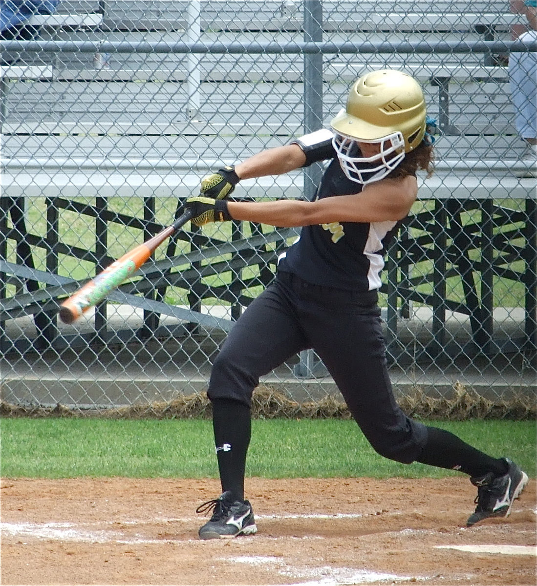 Image: Anna powers one — Anna Viers powers a liner past the Lady Tigers’ infield.