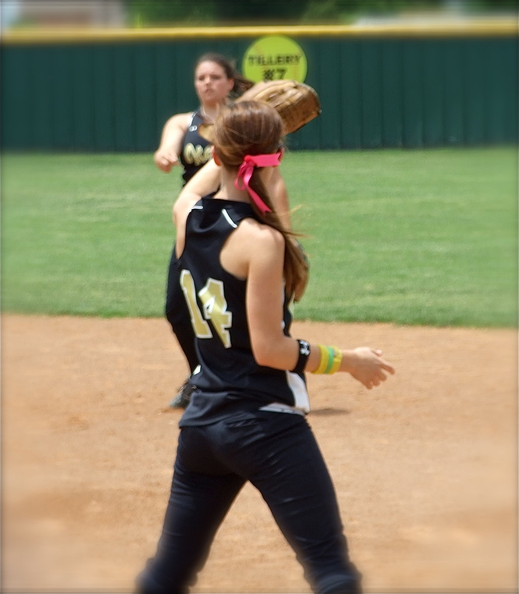 Image: Drew’s reliable — Senior Cori Jeffords and Drew Windham combine for one last out. Windham had an amazing season at first base and leaves behind a pair of cleats that will be hard to fill.