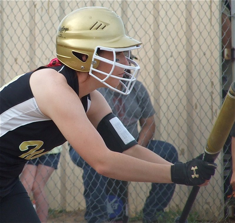 Image: Lining up the target — Bailey Bumpus lines up her next shot straight at the Dawson pitcher.