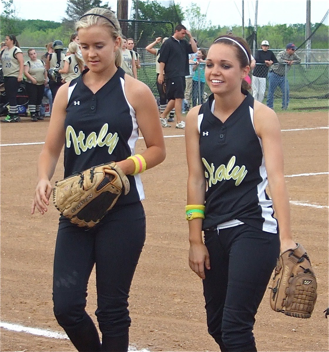 Image: Court &amp; Drew — Courtney Westbrook and Drew Windham head into the dugout for their next at bat.