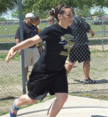 Image: Bales advances — Just a sophomore, Kaytlyn Bales makes the discus finals at the varsity level.