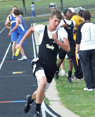 Image: Jase hugs the turn — Jase Holden competes in the relays.
