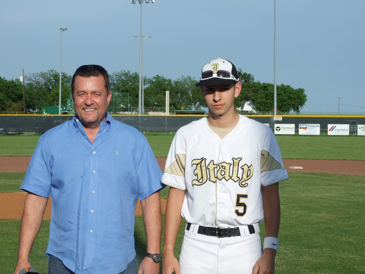 Image: Gonzales is honored — Oscar Gonzales and friend, Judge Jackie Miller, take to the first baseline for an introduction.