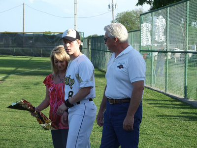 Image: Here come the Milligans — Josh and his parents are introduced to the crowd.