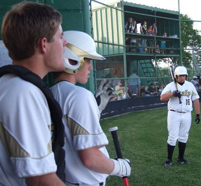 Image: Ashcraft and Buck — Catcher, Ryan Ashcraft, and short stop, Justin Buchanan, watch the game from the dugout.