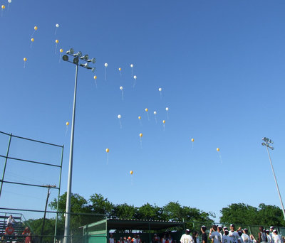 Image: Honored Seniors — The Gladiator Varsity team released balloons in each senior’s honor Friday night.