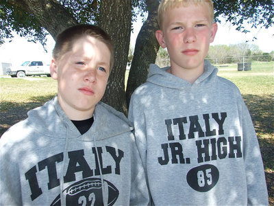 Image: Track faces on — 7th graders John Escamilla and Cody Boyd stay relaxed before their events.